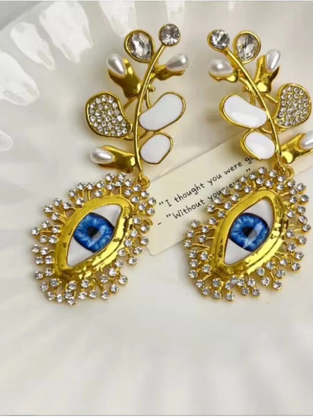 Schiaparelli inspired Gold Floral Drop Earrings with Iridescent Center